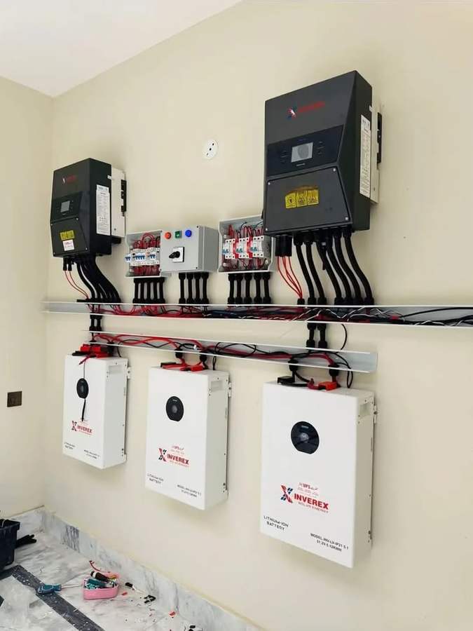 Wall-mounted lithium battery installation with wiring completed